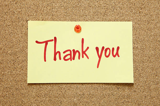 istock Thank you note tacked to a cork board 186841911