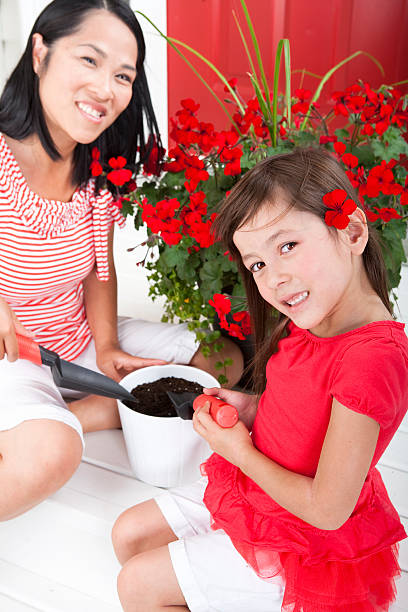 istock Mother and daughter gardening 186842098