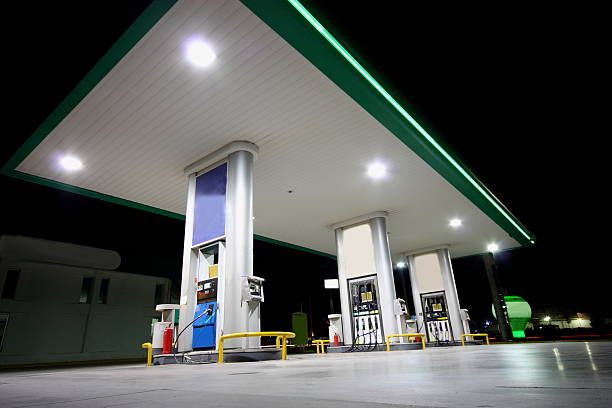 istock Gas station shot from below at night 186842261