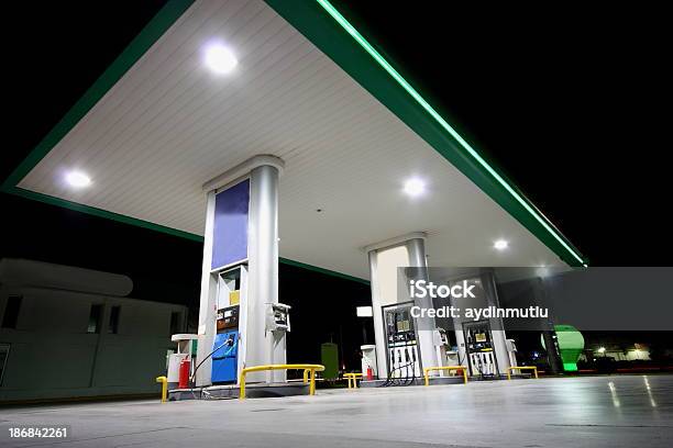Gas Station Shot From Below At Night Stock Photo - Download Image Now - Building Exterior, Convenience Store, Outdoors