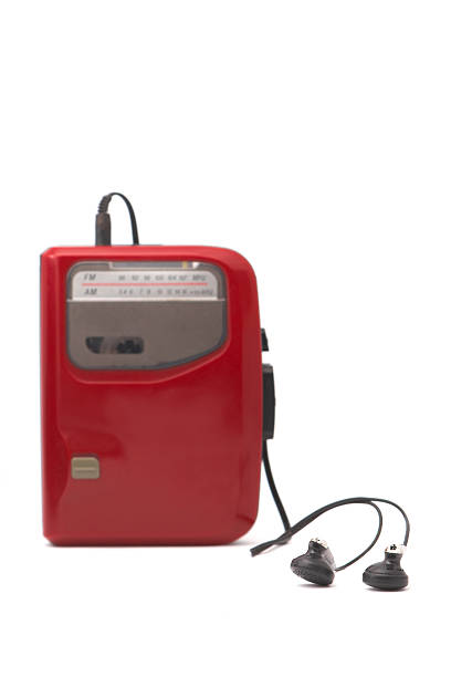 istock A red Walkman with headphones against a white background 186842659
