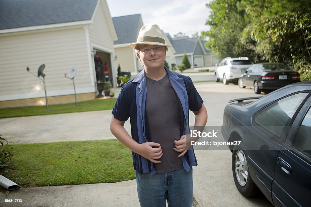 Young Man in Neighborhood Portrait of young caucasian man in a nice neighborhood 20-29 Years Stock Photo