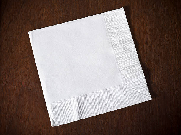 istock Cocktail napkin on wood 186843509
