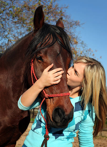 istock Woman and horse 186844016