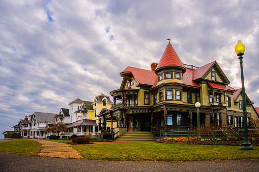 Oak Bluffs skyline, houses, and dramatic winter cloudscape over the Ocean Park on Martha's Vineyard, Massachusetts, Unites States