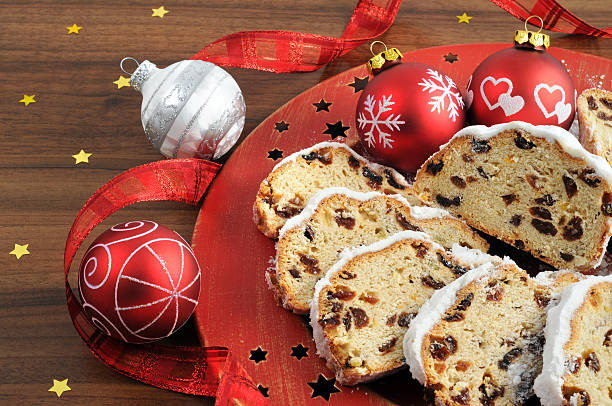 istock christstollen on red plate with star shape ornaments christmas bauble 186845383
