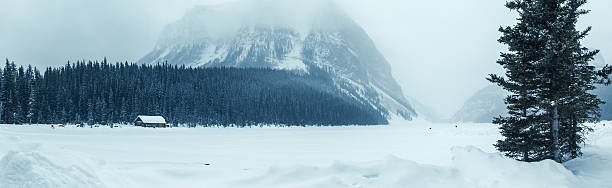 lake louise banff winter scene "lake louise in banff national park, alberta -canadawinter scene, very cold temperatures - panorama images stitched." ca04 stock pictures, royalty-free photos & images