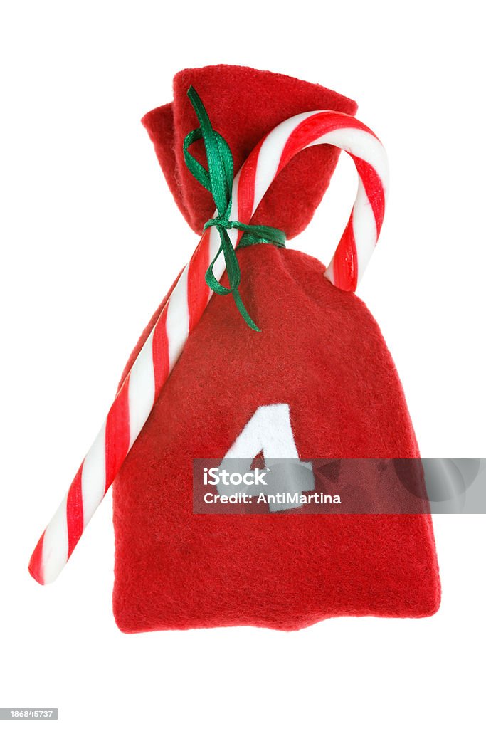 赤いクリスマスのアドベントカレンダーバッグ、白で分離 - アドベントカレンダーのロイヤリティフリーストックフォト