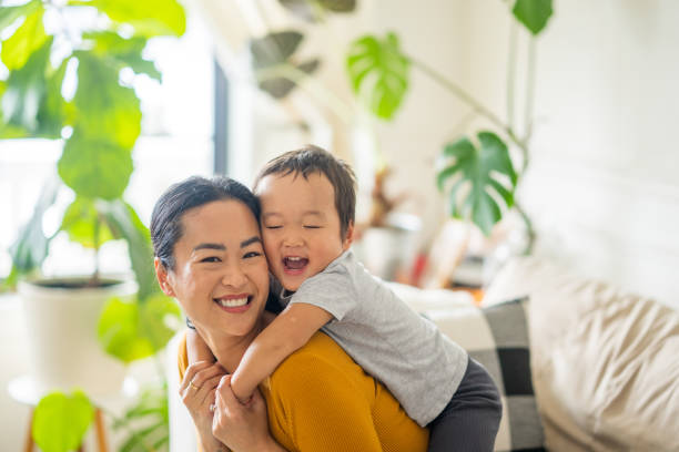 istock Piggyback Rides with Mom 1868457528