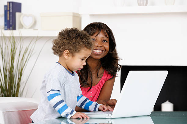 istock Carer/ Mother Pleased With Toddler's Progress 186845802