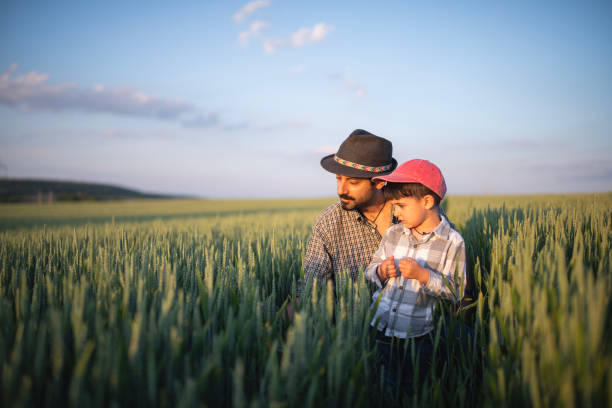 istock Little farmer and his dad. 1868460912