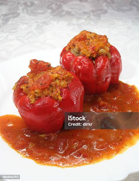 Stuffed Peppers Stock Photo - Download Image Now - Stuffed Pepper, Tomato Sauce, Bell Pepper