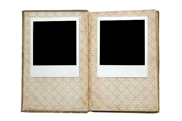 istock Open book with blank polaroid picture 186846592