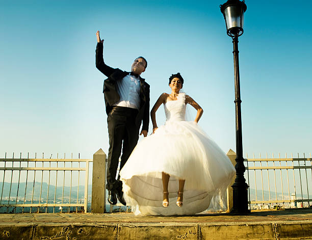 istock Flying Newlywed Couple 186846674