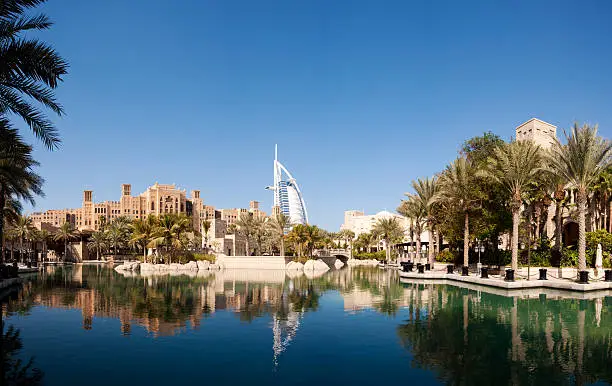 "The Madinat Jumeira area of Dubai, United Aran Emirates. In the background can be seen the Burj Al Arab luxury hotel."