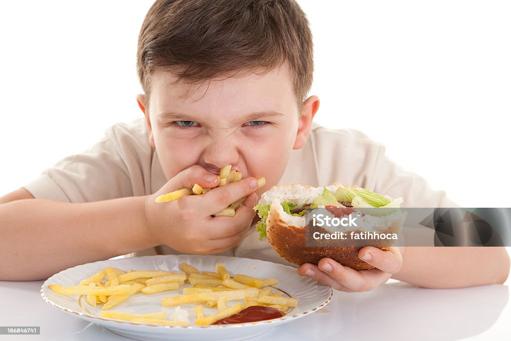 Glutton criança - Foto de stock de Gordo royalty-free