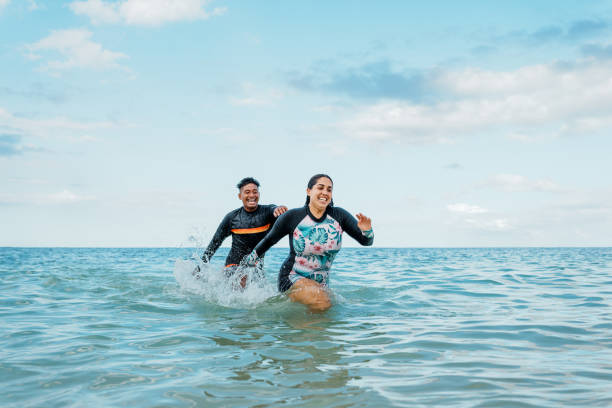 Young couple having fun at the beach