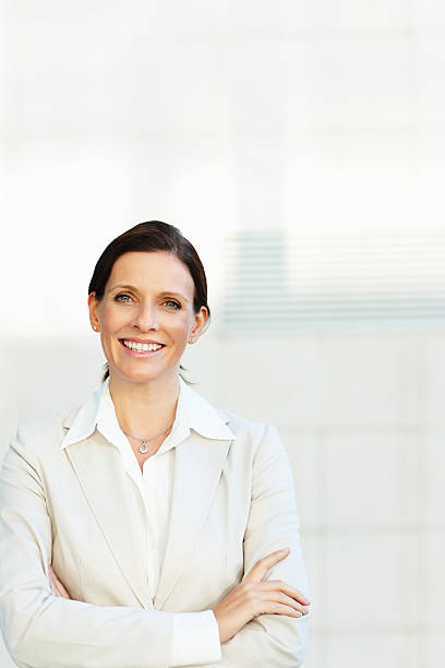 istock Beautiful female executive smiling 186846874