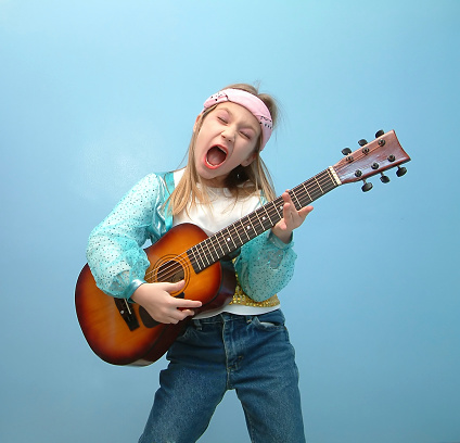 A young girl musician. For more like this checkout