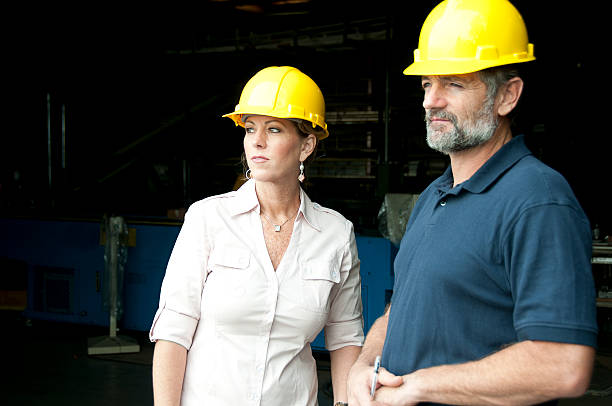 istock Manufacturing Employees, Man and Woman 186847812