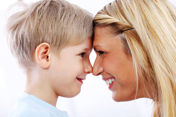 istock Mother and son are touching their heads. 186847977