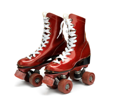 Glamorous roller skates in glittery red.