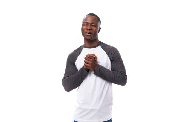 istock young charismatic african man dressed casual smiling on white background with copy space 1868482099