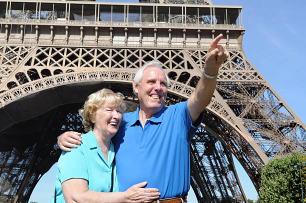 istock Senior couple in front of Eiffel Tower 186848568