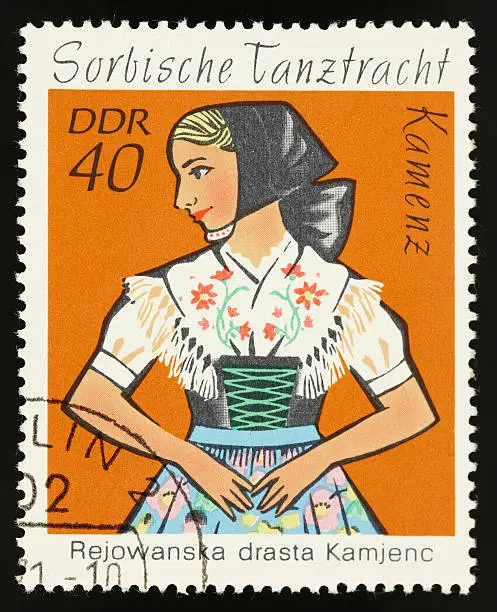 Stamp for sorbian dance costume isolated on black.