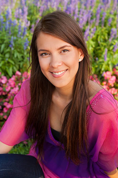 istock Smiling female in the grass 186849134