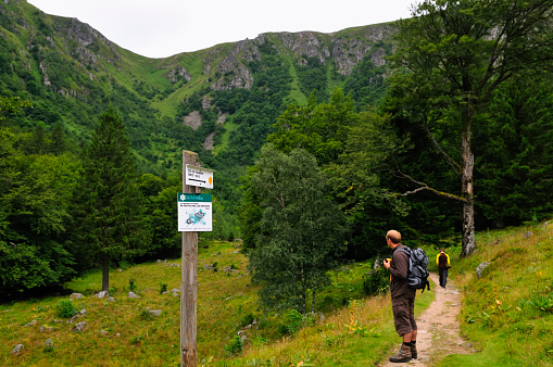 Hikers on a path in the French Vosges region.