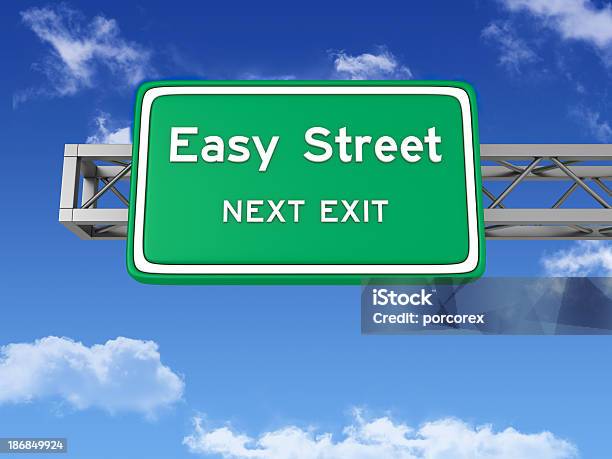 Road Sign With Easy Street And Sky Stock Photo - Download Image Now - Effortless, Street, Arrival