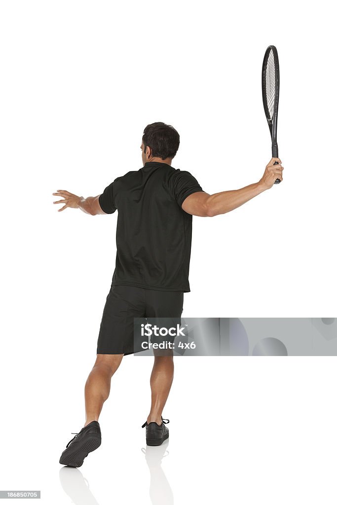 Homem jogando tênis - Foto de stock de Fundo Branco royalty-free