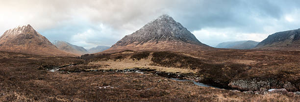 Glencoe and Glen Etive at Sunrise Looking from Rannoch Moor across the River Etive to Buachaille Etive Mor and the mountains at the head of Glen Etive and Glencoe at sunrise. etive river photos stock pictures, royalty-free photos & images