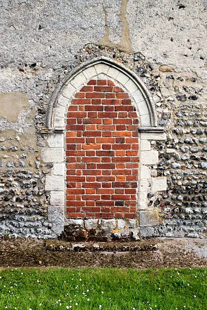 A medieval doorway which has been bricked up centuries later. Seen on an English church.Some doors from my portfolio: