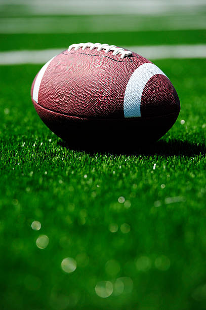 istock Football on field 186851323