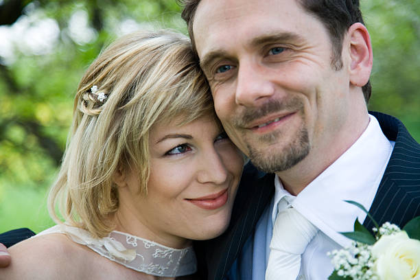 istock man woman wedding portrait III 186851328