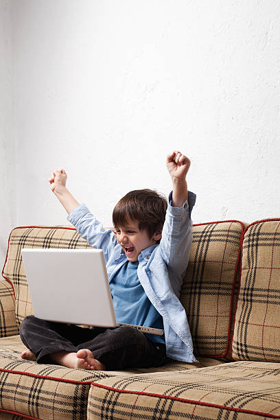 young child with computer stock photo