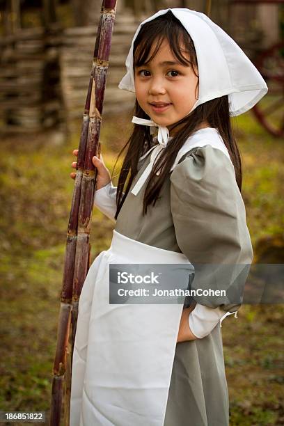 Young Puritan With Sugar Cane Stock Photo - Download Image Now - Pilgrim, Child, Period Costume