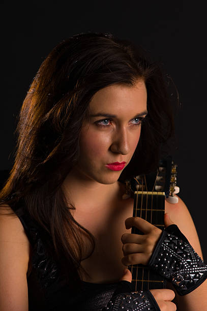 istock young Girl with Guitar 186852813