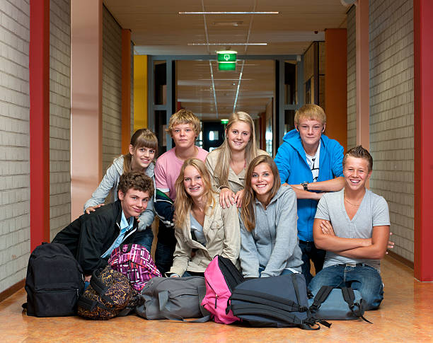 istock class photo of high school students in hallway 186852926