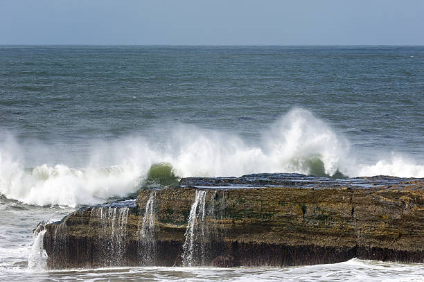 istock Ocean Waves Crashing On Rocky California Shore 186852991