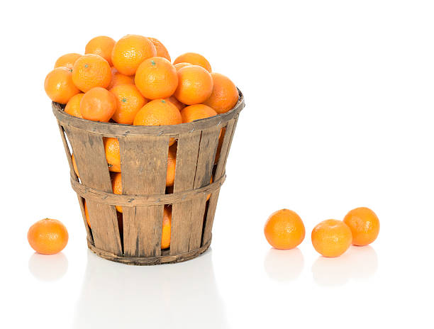 Mandarin Oranges in a Rustic Basket stock photo