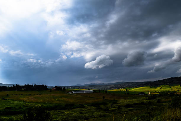 istock landscape with sky full of clouds 1868535730