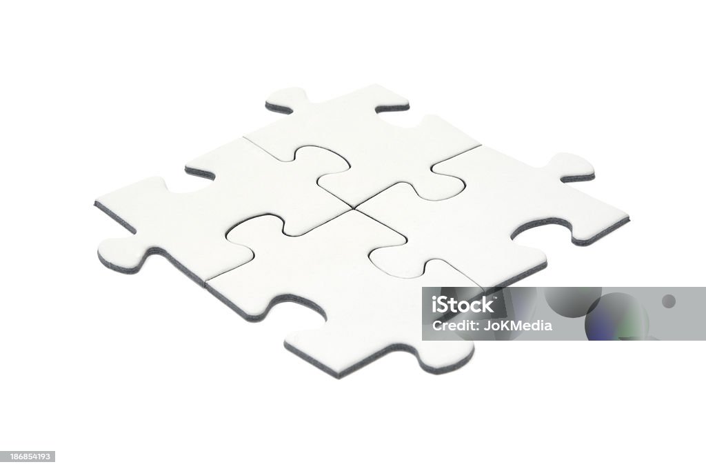 Quatre pièces de puzzle blanc - Photo de Arranger libre de droits