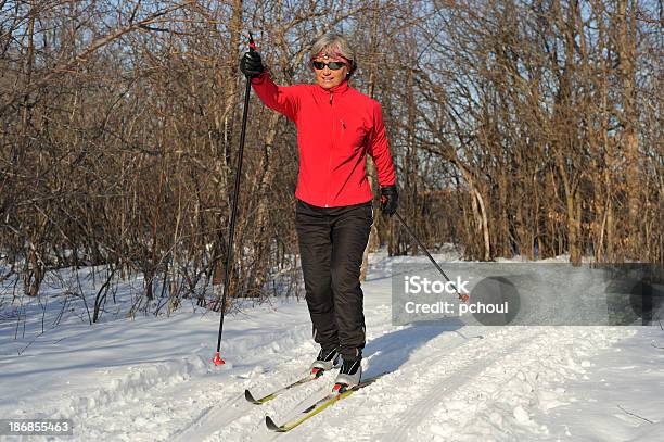 Woman Crosscountry Skiing Winter Sport Stock Photo - Download Image Now - 30-39 Years, Active Lifestyle, Active Seniors