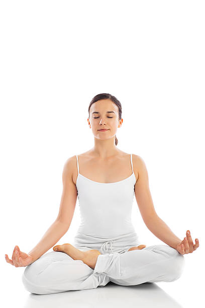 istock Young woman exercising yoga 186855582