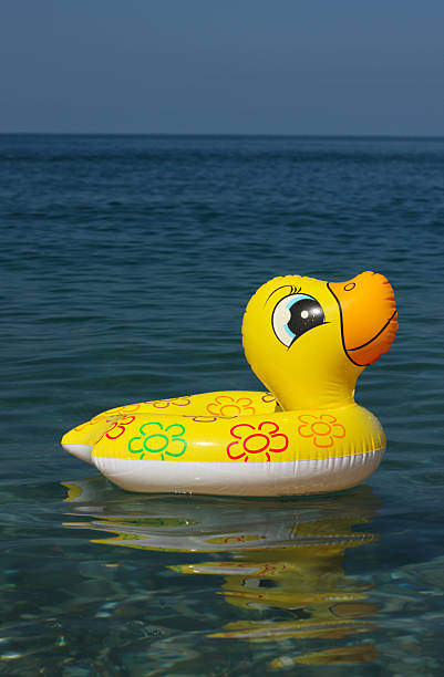 istock Toy duck on a water 186856768