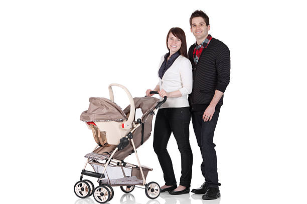 istock Couple standing near a pram 186856784