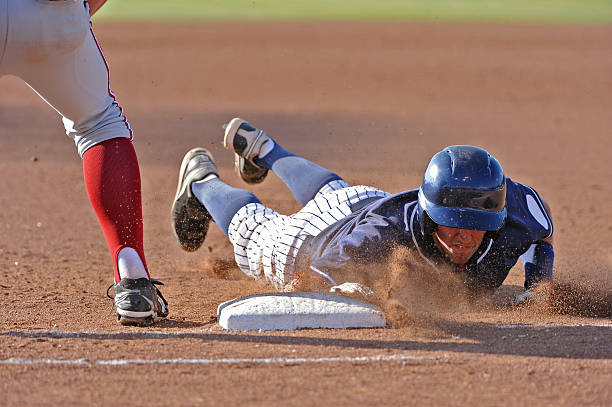 野球選手 - baseball baseball player base sliding ストックフォトと画像